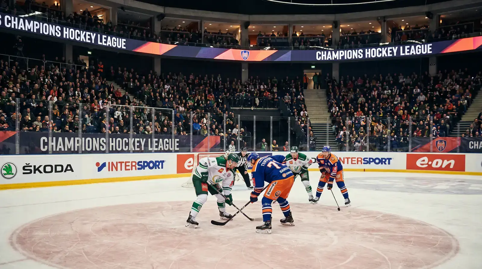European club hockey teams facing off during a Champions Hockey League group stage game