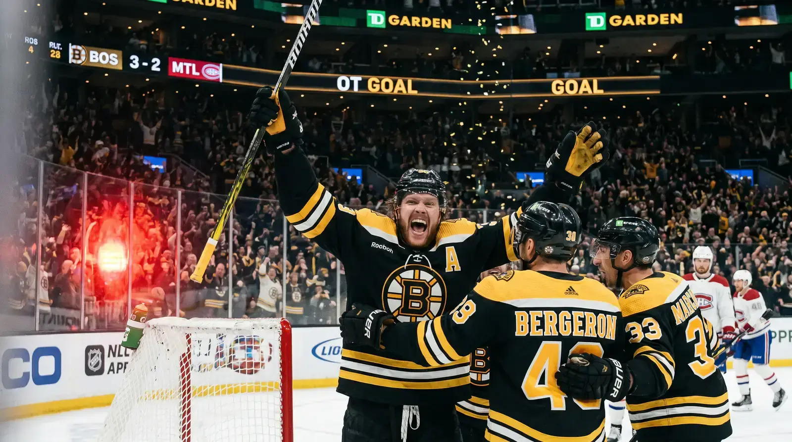Hockey player celebrating after scoring the first goal of a game