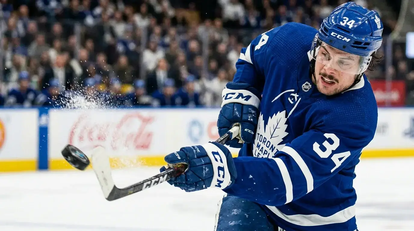 Close-up of an NHL forward taking a shot on goal representing player prop bets