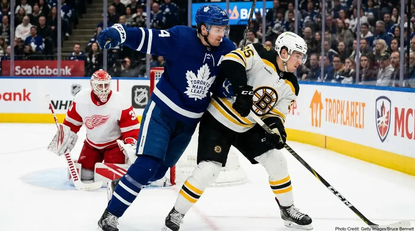 Hockey players battling for position near the net during an NHL game