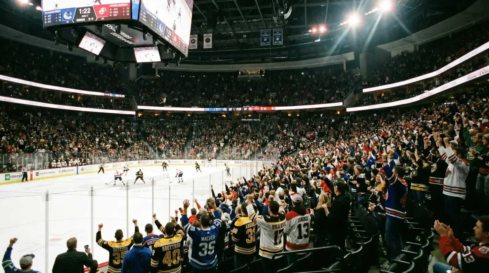 NHL arena packed with fans during a regular season ice hockey game