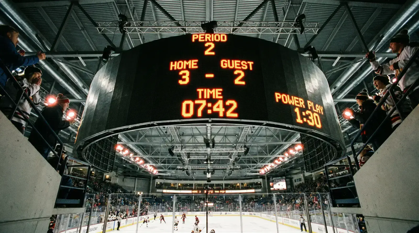 NHL arena scoreboard showing period score and time remaining during live play