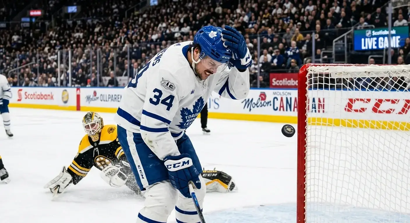 Hockey player looking frustrated after a near-miss shot off the post