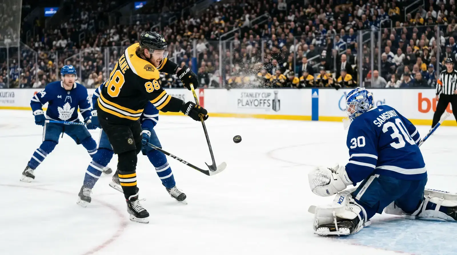 Hockey forward shooting from the slot area during a high-danger scoring chance
